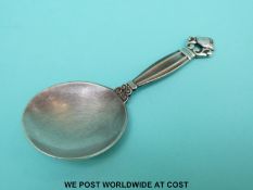 A Georg Jensen hallmarked silver caddy spoon stamped sterling Denmark and Georg Jensen Silversmiths