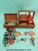 A collection of compacts, beaded necklaces, chains, silver chain and locket, silver brooch etc.