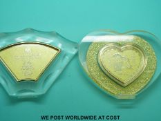 Two yellow metal plaques marked 999.