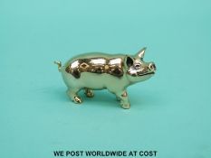 A hallmarked silver model of a pig, import marks to underside but indistinguishable,
