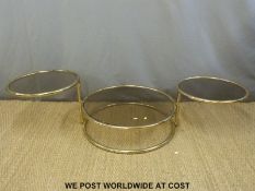 A three-tier circular coffee table with fold-out higher tiers (height 40cm,