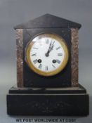 A 19th century two train architectural cased slate mantel clock with pink decorative marble insets,