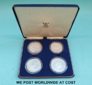 Four 'crown sized' Royal Mint coins in case, Ethiopia, Mongolia,