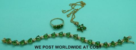 A suite of 9ct gold jewellery comprising ring,