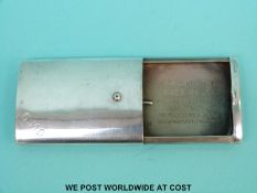 A George V hallmarked silver vesta or cigarette case of unusual slide out design,