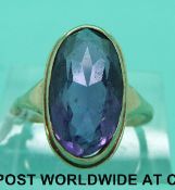 A 9ct gold ring set with an oval amethyst (size P)