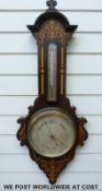 A 19thC holosteric wall barometer in rosewood case with Sorrento style inlaid decoration,