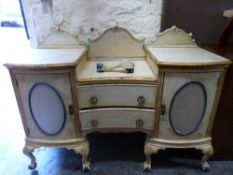 A French style breaktop serpentine fronted credenza raised on ball and claw feet (W153 x D59 x