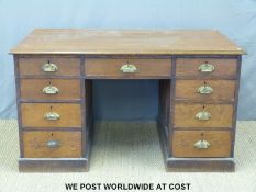 An oak twin pedestal desk and chair (L138 x D82 x H78cm)