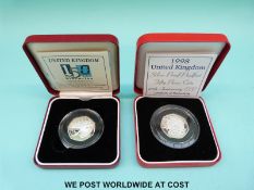 Two cased UK silver proof 50 pence Piedfort coins with certificates comprising 1998 Libraries and