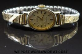 Omega De Ville ladies wristwatch with baton markers, two tone hands and gold face,