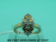 A 9ct gold ring set with diamonds (Size M)