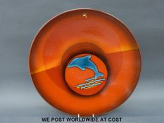 A retro Poole charger bowl with dolphin decoration (40cm diameter)