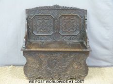 A 19th/20th century carved oak monk's bench (W91 x D40 x H98cm)