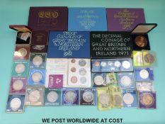A collection of proof coin packs, crowns etc.