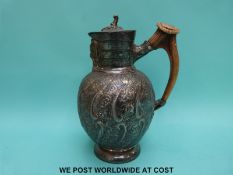 A plated pedestal mask jug with stag horn handle,