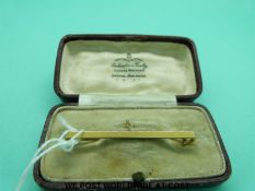 An 18ct gold tie pin (4.