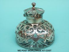 An Edward VII hallmarked silver mounted cut glass inkwell,