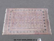 A pale pink Turkoman rug (295 x 185cm)