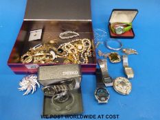 A collection of jewellery to include watches, hallmarked silver bangle, Sarah Coventry brooch,