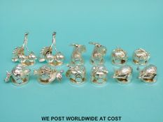 A set of 12 silver plated menu holders formed as various fruit (six pairs), maximum height 4.