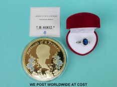 A Princess Diana 'Portrait of a Princess' coin set with Swarovski crystal and replica Diana