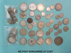 A collection of UK and overseas silver coinage, William IV, South Africa, three penny pieces etc.