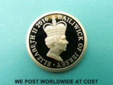 A cased Queen Elizabeth II's 90th Birthday gold one pound coin in a limited edition of 995,