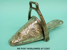 A 19th century plated and pierced ladies sidesaddle stirrup,