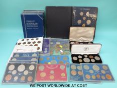 A large collection of coin sets, UK specimen and overseas, including farthings, cents etc.