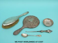 A hallmarked silver backed mirror, silver brush, Exeter spoon,