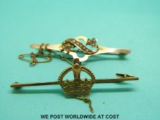 A 9ct gold brooch set with seed pearls and a 9ct gold brooch set with a crown (4.