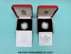 Two cased UK silver proof Piedfort £1 coins with certificates 1989 and 1999