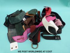 A box of vintage ladies leather and similar belts