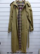 A ladies vintage Mulberry trench coat in beige, size M.
