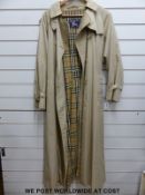 A gentlemen's full length Burberry trench coat approximately 38-40