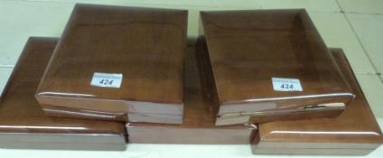 Five varnished multiple ring boxes