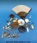 A carved bakelite pin cushion, a sewing case in the form of an acorn, small silver spoons,