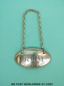 A Georgian hallmarked silver Rum bottle ticket with Georgian duty mark,