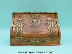 A walnut and pierced brass Asprey letter rack, width 23.