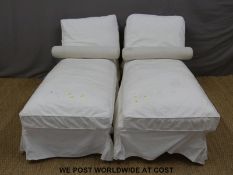 Two day beds with various cushions