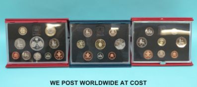 Three deluxe cased UK proof coin sets comprising 1990, 1994,