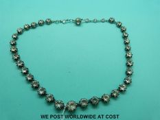 A Victorian white metal necklace set with large paste foiled stones