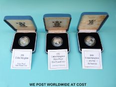 Three cased Royal Mint £1 silver proof coins for 1989, 1990 and 1992,