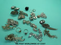 A collection of silver jewellery to include filigree brooches, silver earrings etc.