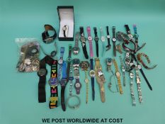 Over 40 various ladies and gentleman's wristwatches including Lorus, Swatch etc.