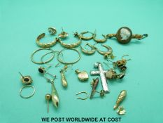 A 9ct white gold cross pendant, a quantity of 9ct gold earrings etc. (gold 6.