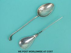 A hallmarked silver golfing spoon, Chester possibly 1924 and a mote spoon,