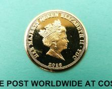 A cased 'Year of the Three Kings' gold coin with certificate of authenticity