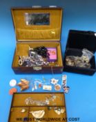 A collection of costume jewellery to include brooches, silver necklace, silver pendants,